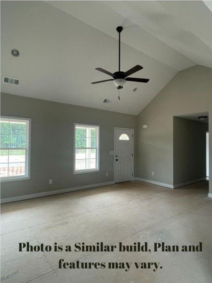 entryway featuring vaulted ceiling and ceiling fan