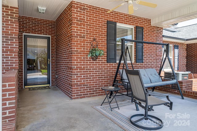 view of patio with ceiling fan