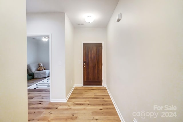 hallway featuring light wood-type flooring