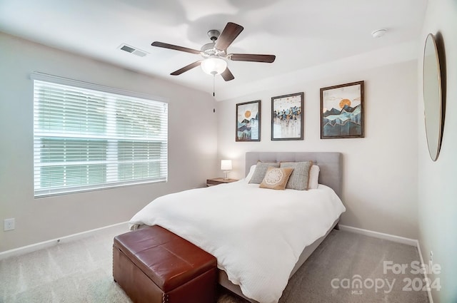 carpeted bedroom featuring ceiling fan