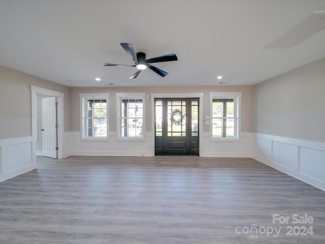 40 Ridgecrest Ave, Peachland, NC 28133 - entrance foyer featuring wainscoting, wood finished floors, ceiling fan, recessed lighting, and a decorative wall