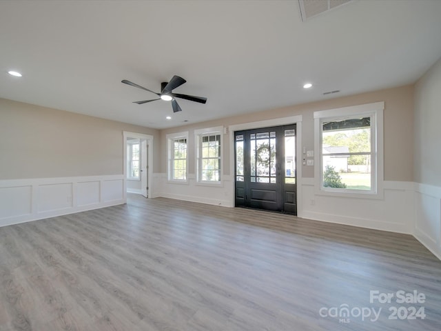 40 Ridgecrest Ave, Peachland, NC 28133 - foyer entrance featuring wainscoting, ceiling fan, wood finished floors, a decorative wall, and recessed lighting