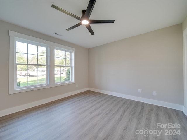 40 Ridgecrest Ave, Peachland, NC 28133 - empty room with light wood finished floors and a ceiling fan