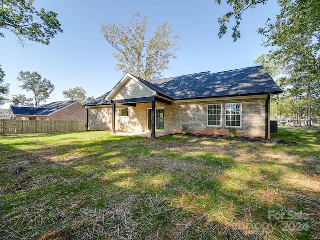 40 Ridgecrest Ave, Peachland, NC 28133 - view of front of home featuring brick siding, a patio, and a shingled roof