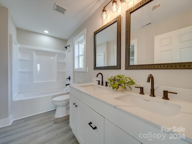 40 Ridgecrest Ave, Peachland, NC 28133 - bathroom with double vanity, bathtub / shower combination, wood finished floors, and recessed lighting