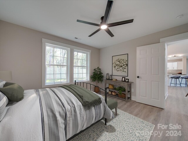 40 Ridgecrest Ave, Peachland, NC 28133 - bedroom with light wood finished floors and a ceiling fan