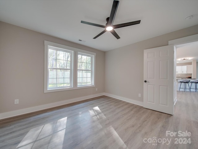 40 Ridgecrest Ave, Peachland, NC 28133 - unfurnished room featuring light wood-style floors, a ceiling fan, and a smoke detector