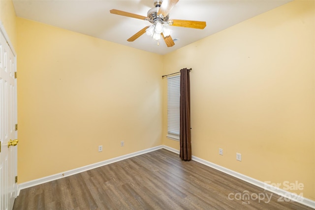 unfurnished room featuring hardwood / wood-style flooring and ceiling fan