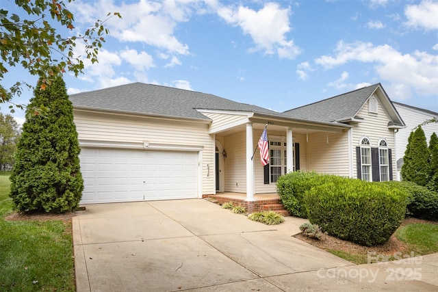 ranch-style home with a garage and covered porch