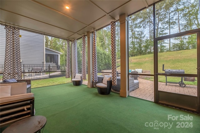 sunroom / solarium featuring plenty of natural light