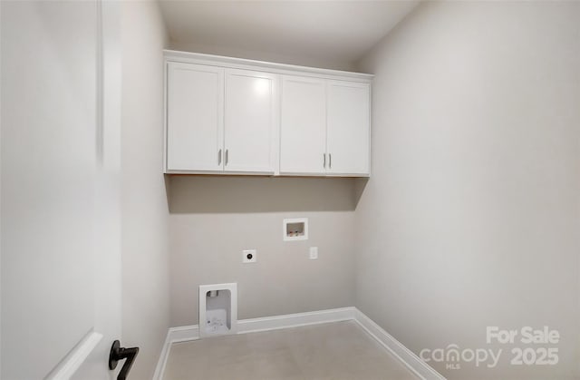 clothes washing area featuring cabinets, washer hookup, and electric dryer hookup