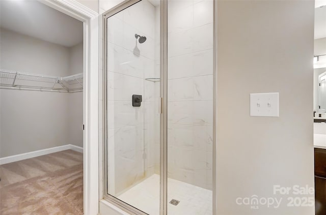 bathroom with a shower with shower door