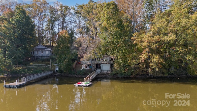 dock area with a water view