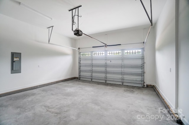 garage featuring a garage door opener and electric panel