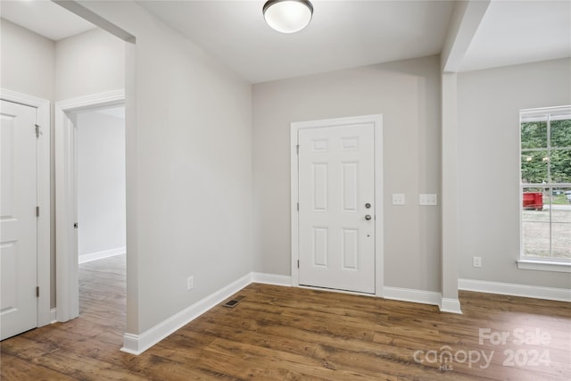 foyer entrance with hardwood / wood-style flooring