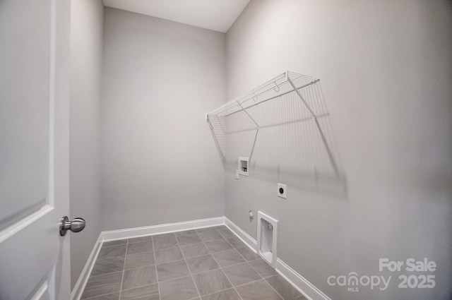 clothes washing area featuring hookup for a washing machine, hookup for an electric dryer, gas dryer hookup, laundry area, and baseboards