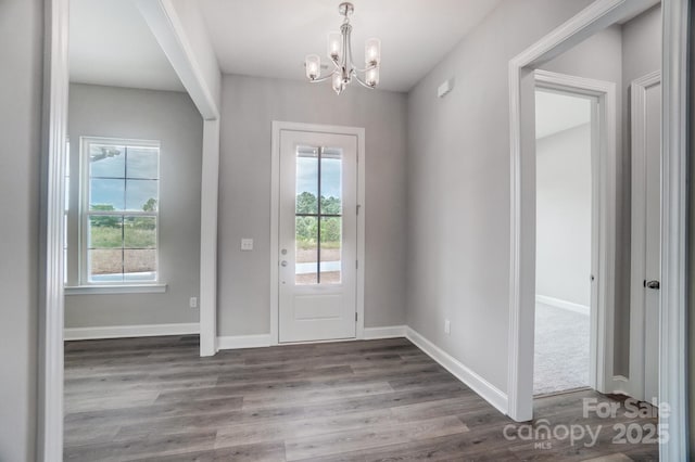 552 Fern Hill Rd Unit 21, Mooresville, NC 28117 - entrance foyer featuring a chandelier, dark wood finished floors, and baseboards