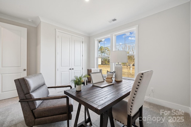 office space with ornamental molding and carpet floors