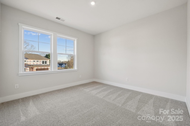 view of carpeted spare room