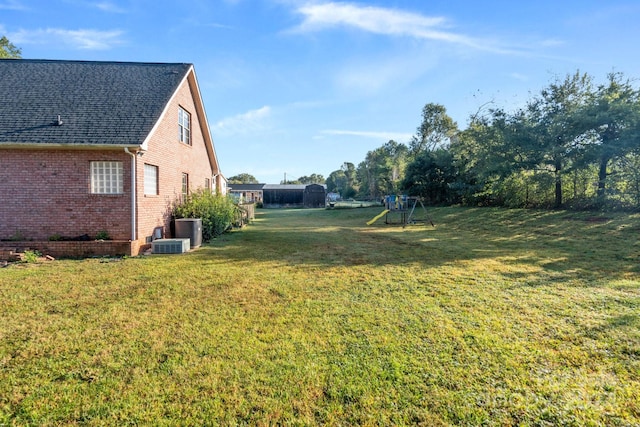 view of yard featuring central AC