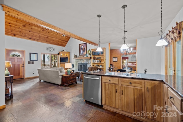 kitchen with dishwasher, vaulted ceiling with beams, hanging light fixtures, sink, and a fireplace