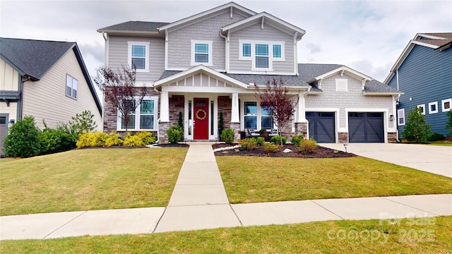 craftsman-style house featuring a front yard, a garage, and covered porch