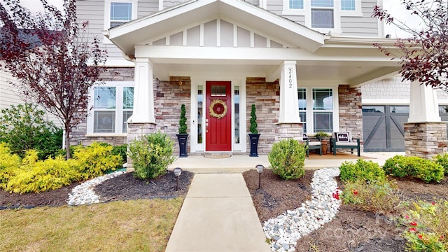 entrance to property with a porch