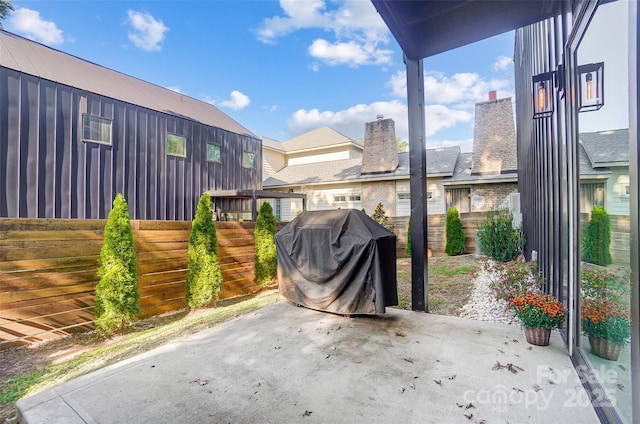 view of patio / terrace with fence and area for grilling