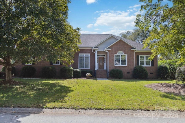 view of front of house with a front yard