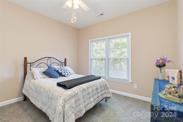 carpeted bedroom featuring ceiling fan