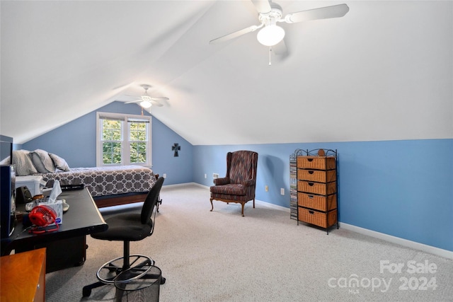 bedroom with ceiling fan, light carpet, and vaulted ceiling