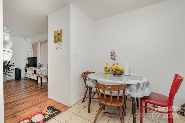 dining area with light wood-type flooring