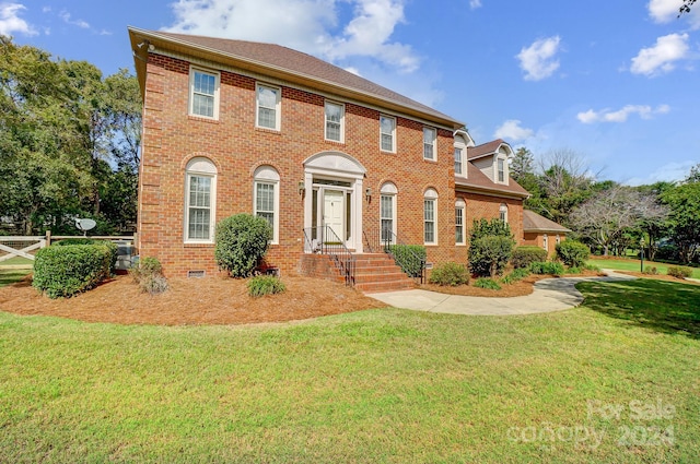 colonial house with a front lawn