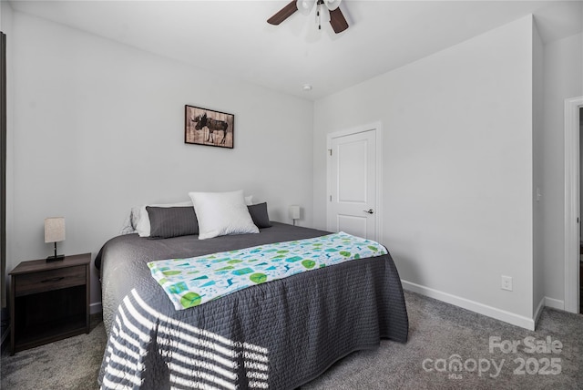 carpeted bedroom with baseboards and ceiling fan