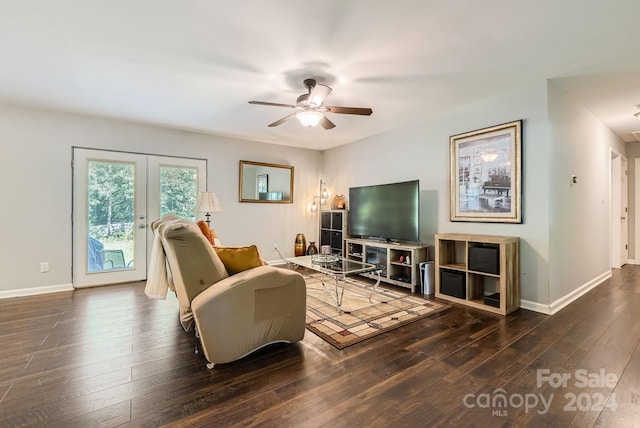 living room featuring ceiling fan, dark hardwood / wood-style floors, and french doors