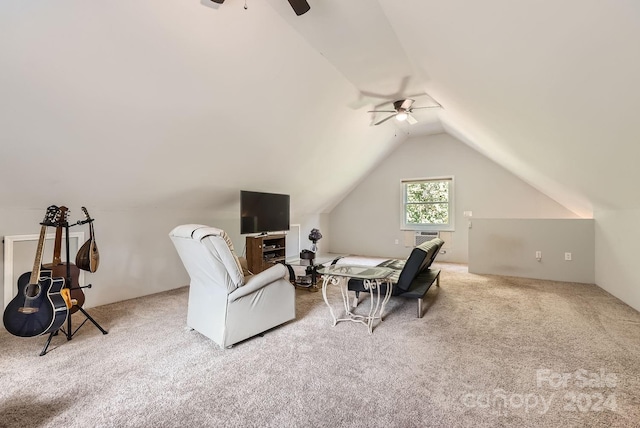 living area featuring carpet, vaulted ceiling, and ceiling fan