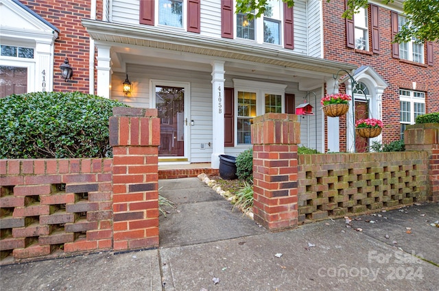 doorway to property featuring a porch