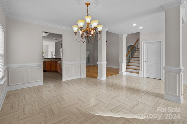 unfurnished dining area featuring light parquet floors, ornamental molding, and a notable chandelier