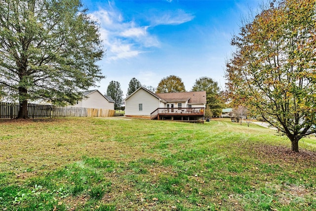 view of yard featuring a deck