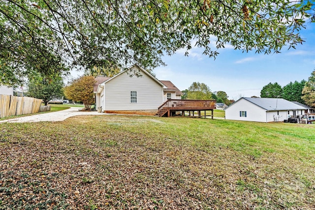 view of yard with a wooden deck