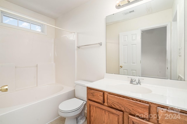 full bathroom with vanity, bathing tub / shower combination, and toilet