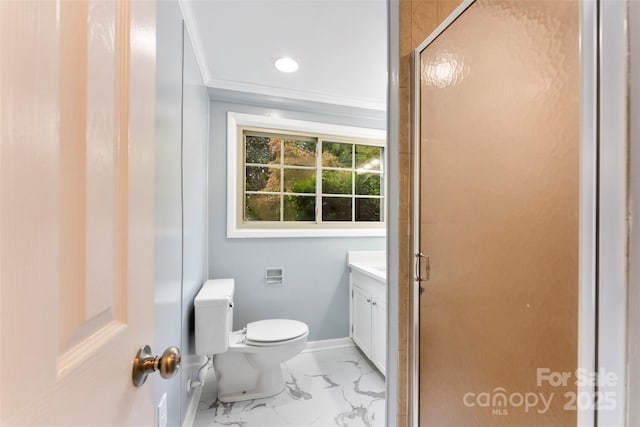 bathroom with vanity, an enclosed shower, crown molding, and toilet