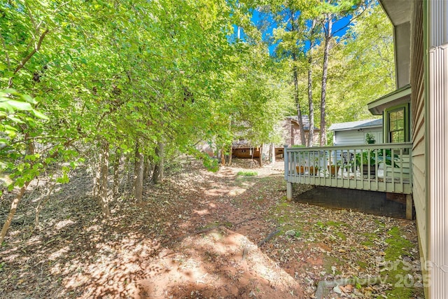 view of yard featuring a deck