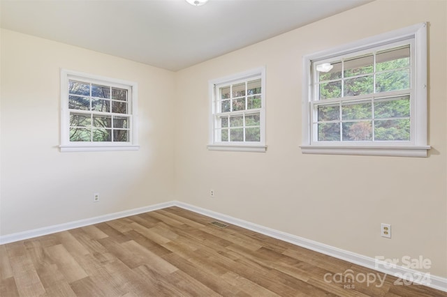 empty room featuring light hardwood / wood-style flooring