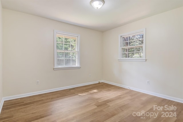 empty room featuring light wood-type flooring