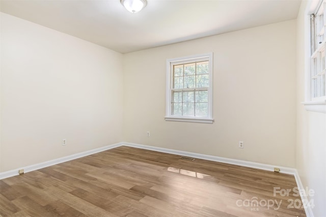 empty room featuring light hardwood / wood-style floors