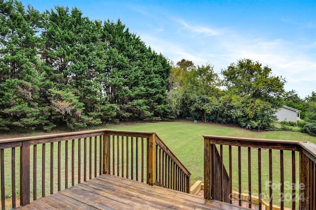 deck featuring a yard