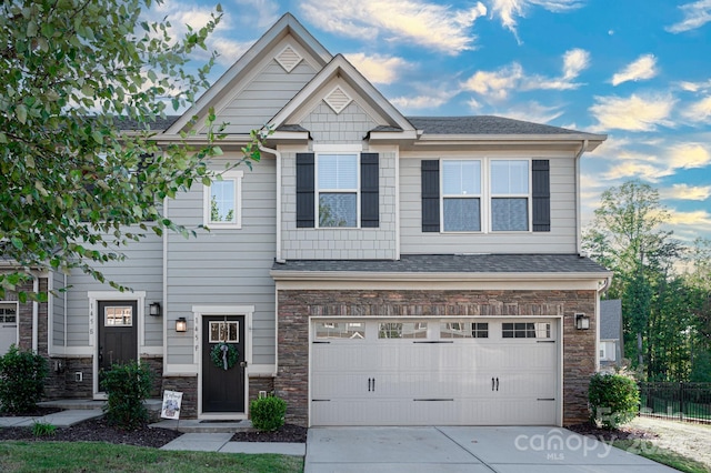 craftsman house featuring a garage