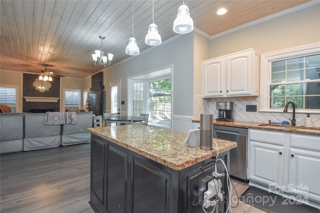 kitchen with white cabinets, stainless steel dishwasher, wooden ceiling, and hanging light fixtures