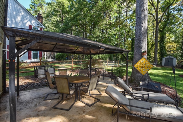 view of patio / terrace featuring a storage shed